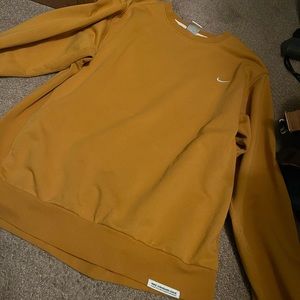 Yellow Nike pullover